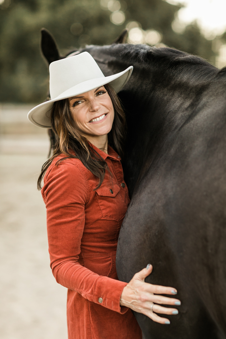 woman smiling with black horse during Amanda Garcia Equestrian session with California Equine Photographer, Elizabeth Hay Photography.
