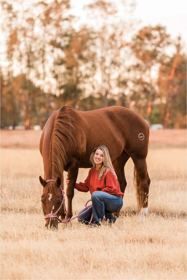 woman kneeling with her chestnut horse by California Equine Photographer Elizabeth Hay Photography