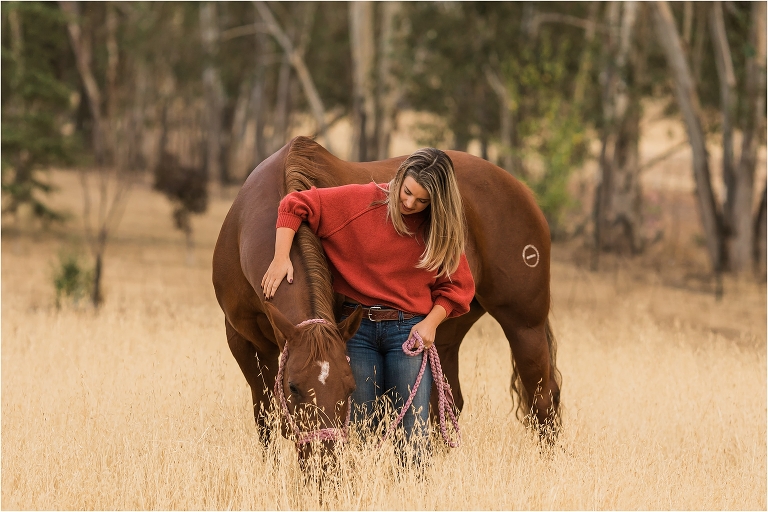 blonde woman and chestnut mare