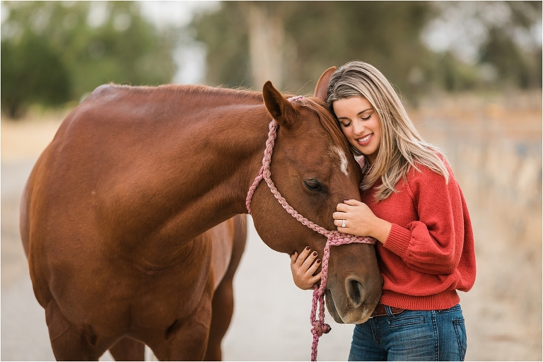woman resting her head on her horse by California Equine Photographer Elizabeth Hay Photography