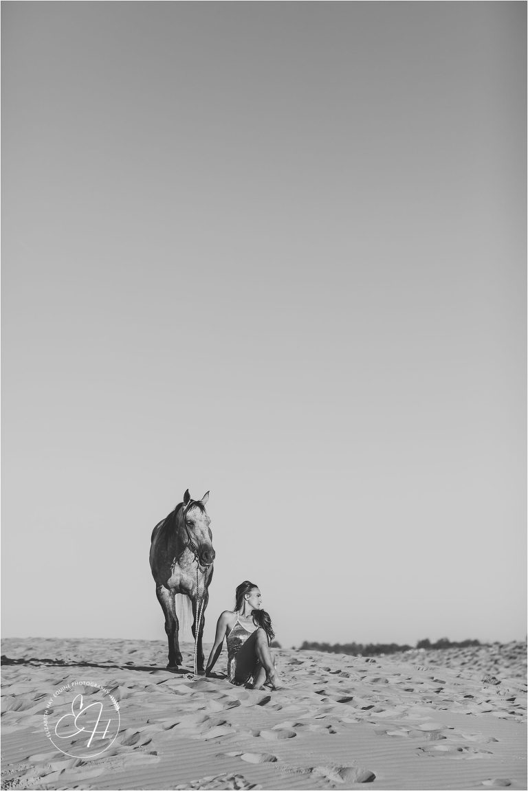 Girl and grey horse at the Pismo Beach Dunes by Elizabeth Hay Photography