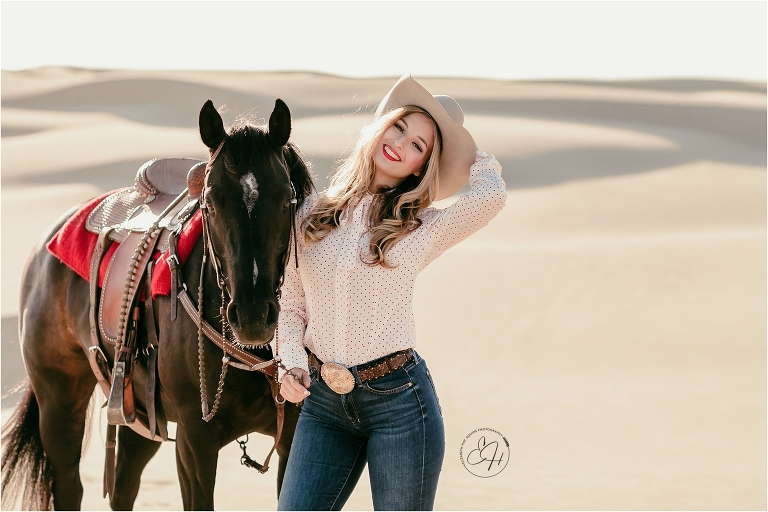 Equine Photography Workshop with Elizabeth Hay Photography in Pismo Beach California with blonde cowgirl and black mare