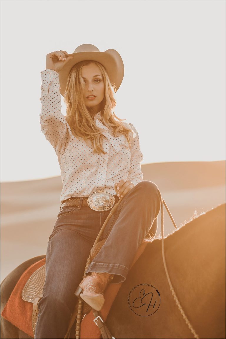 high fashion equine shoot at the Pismo Beach Dunes by Elizabeth Hay Photography with horse and cowgirl