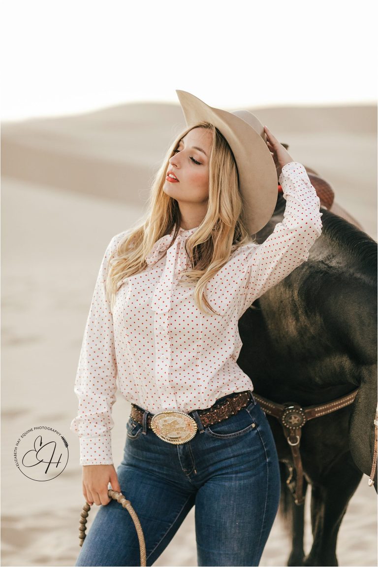 cowgirl model at a high fashion equine shoot at the Pismo Beach Dunes by Elizabeth Hay Photography