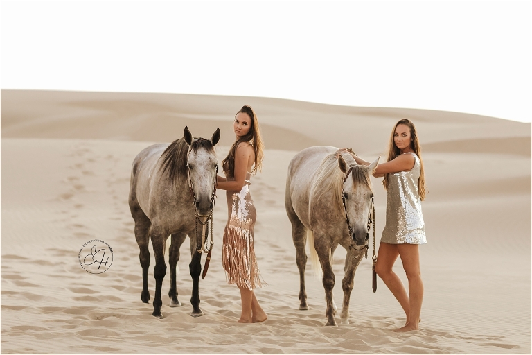 girls and grey horses at a high fashion equine shoot at the Pismo Beach Dunes by Elizabeth Hay Photography