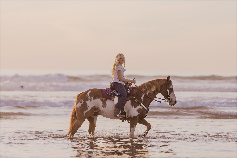 Girl and paint horse in the ocean by California Equine Photographer Elizabeth Hay Photography 