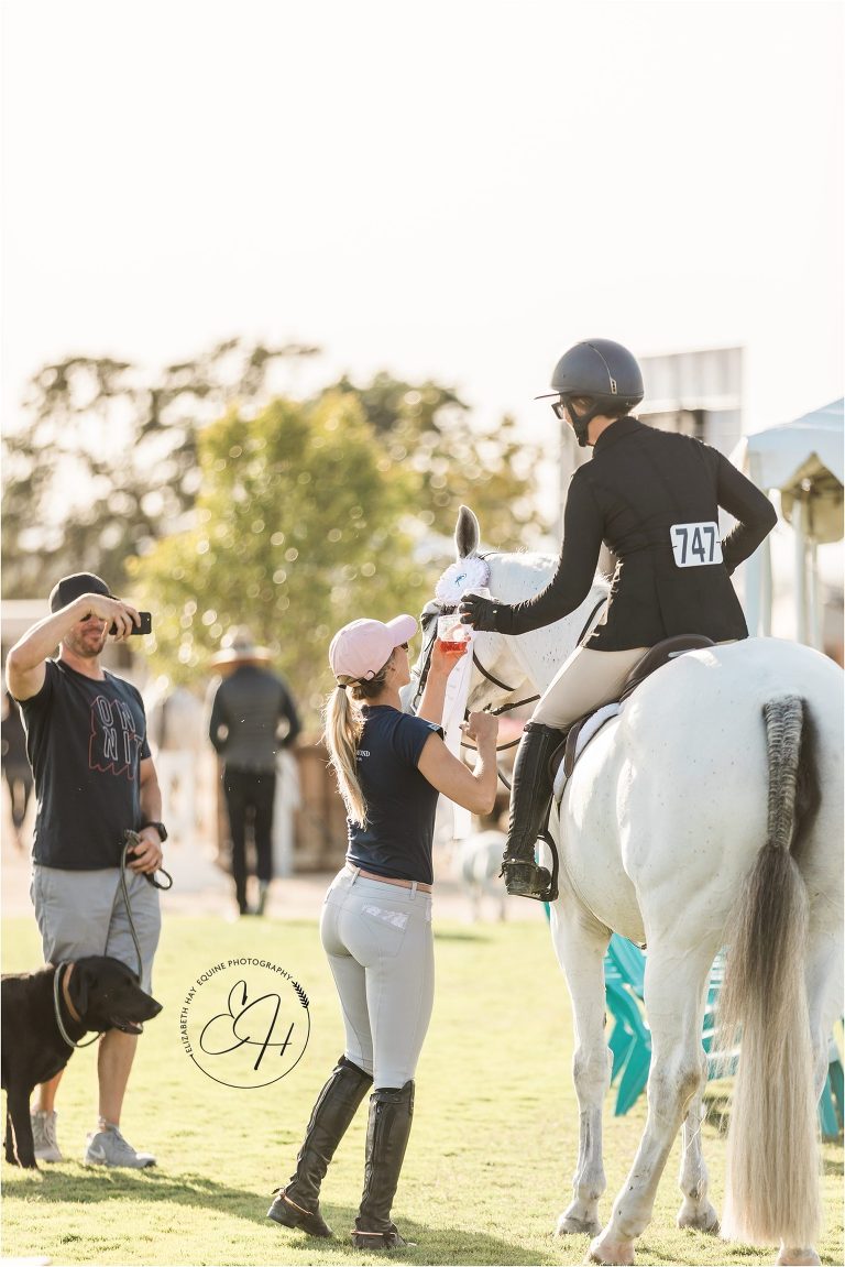 rider and horse trainer celebrating at the Horse Park in Paso Robles California by Elizabeth Hay Photography