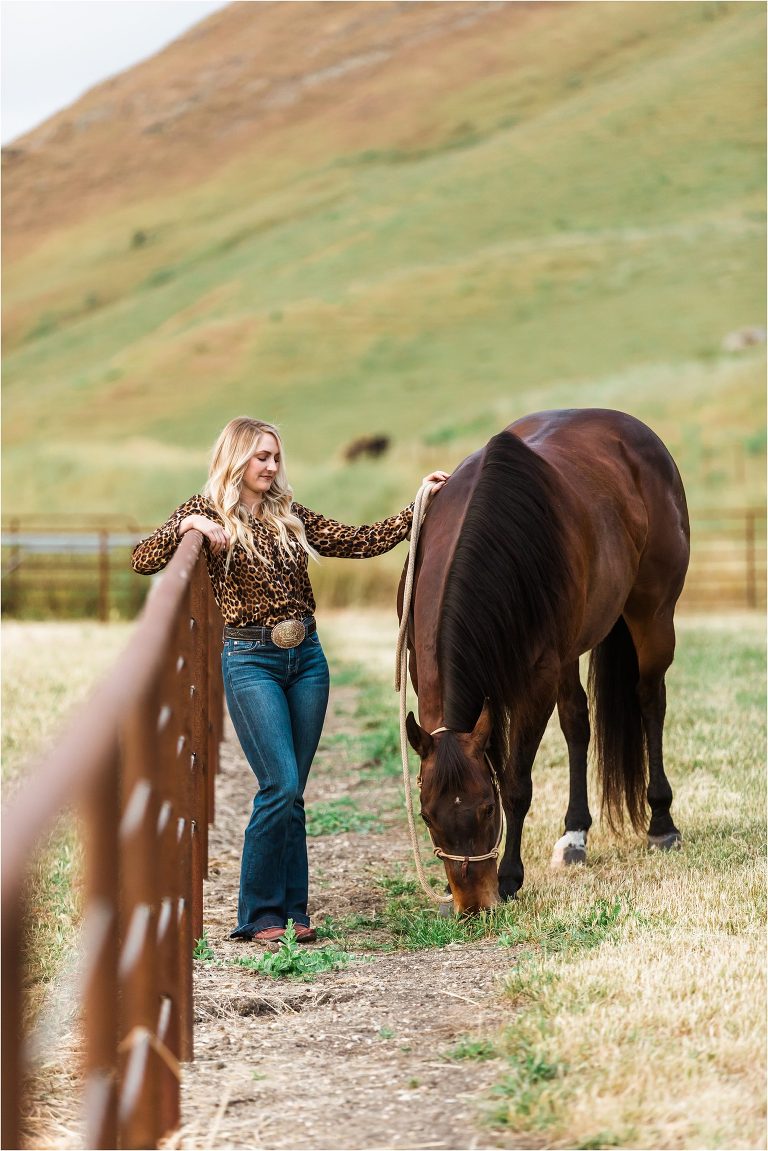 woman petting a bay horse by California Equine Photographer Elizabeth Hay Photography