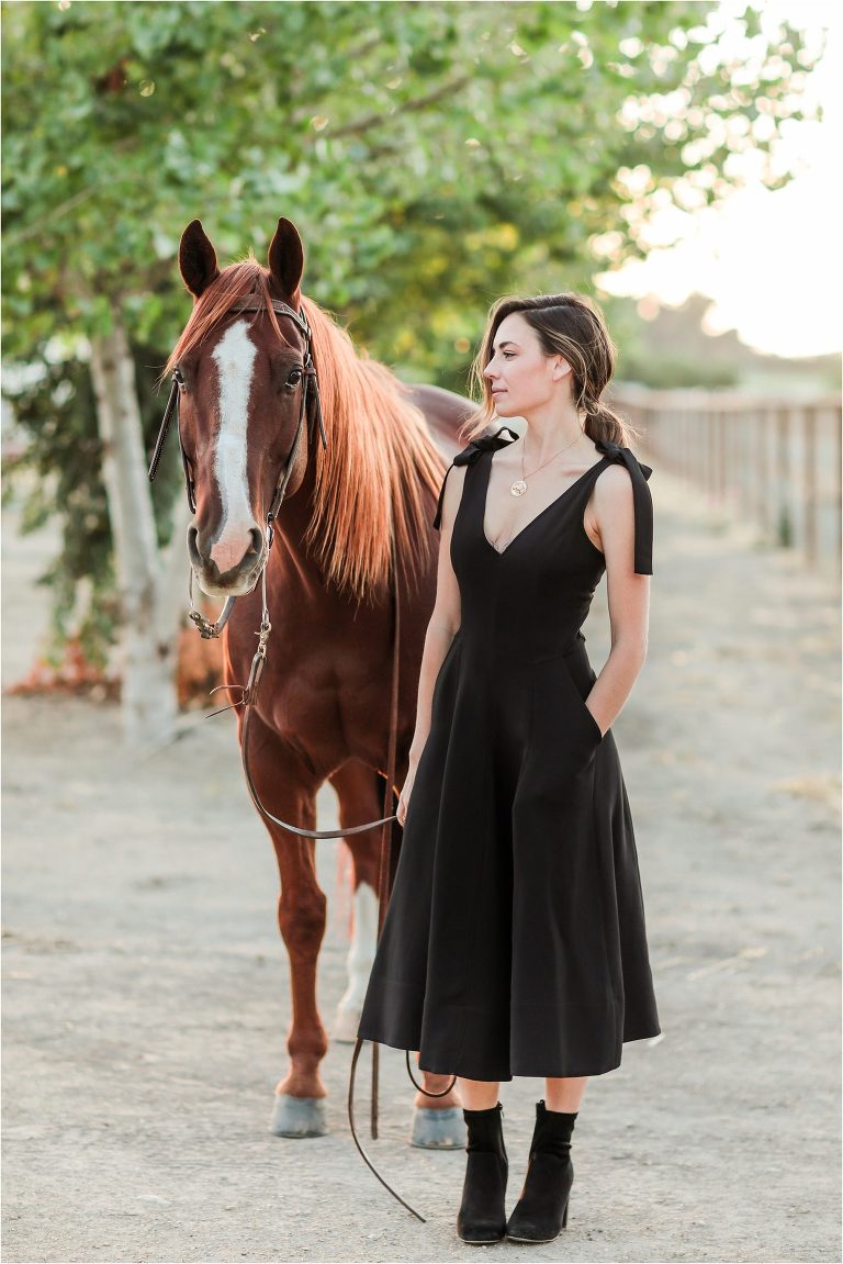 Los Alamos Equine Photography session with woman in black dress and a red horse photographed by Elizabeth Hay Photography