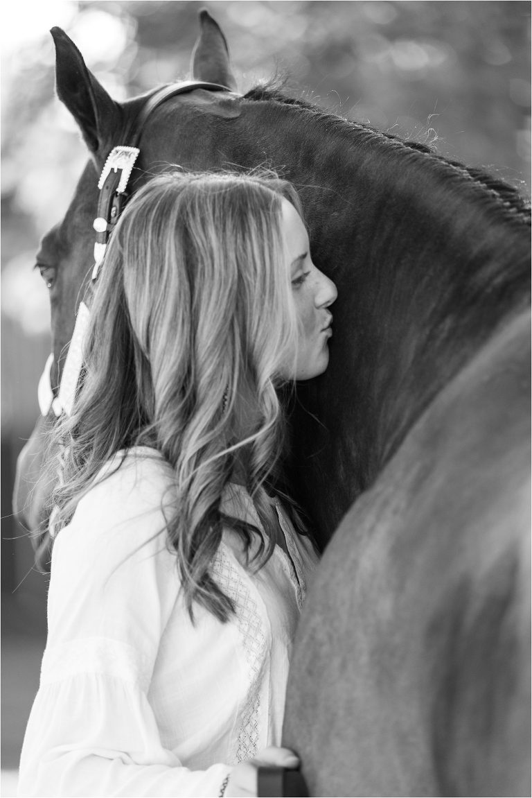 California Equine Photographer Elizabeth Hay Photography image of girl kissing her horse.