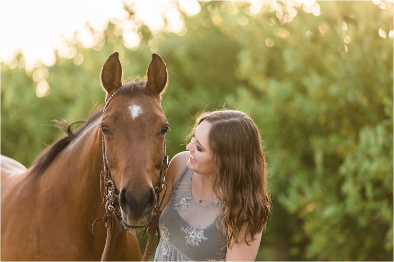 California Equine Photography Session of girl and her horse in an orchard by Elizabeth Hay Photography. 