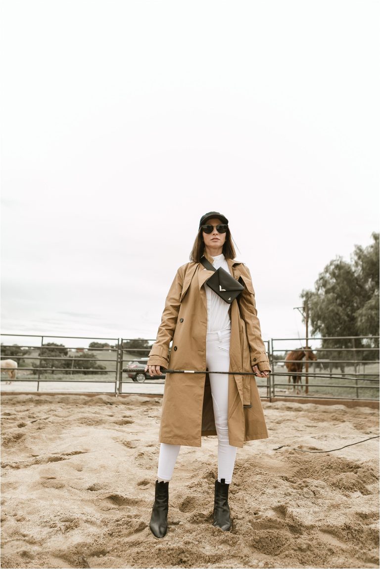 High Fashion Equestrian photo shoot with Milton Menasco wearing Free Rein breeches and trench coat from Target.