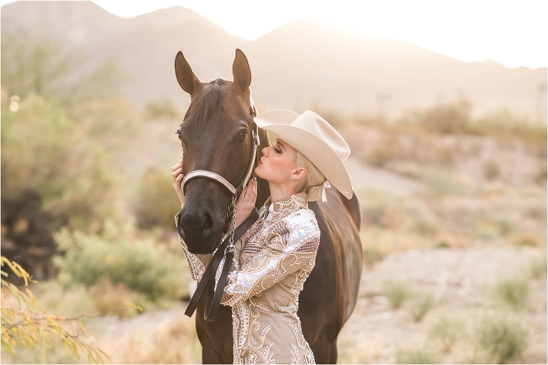Equestrian kissing her horse by California Equine Photographer Elizabeth Hay Photography. 