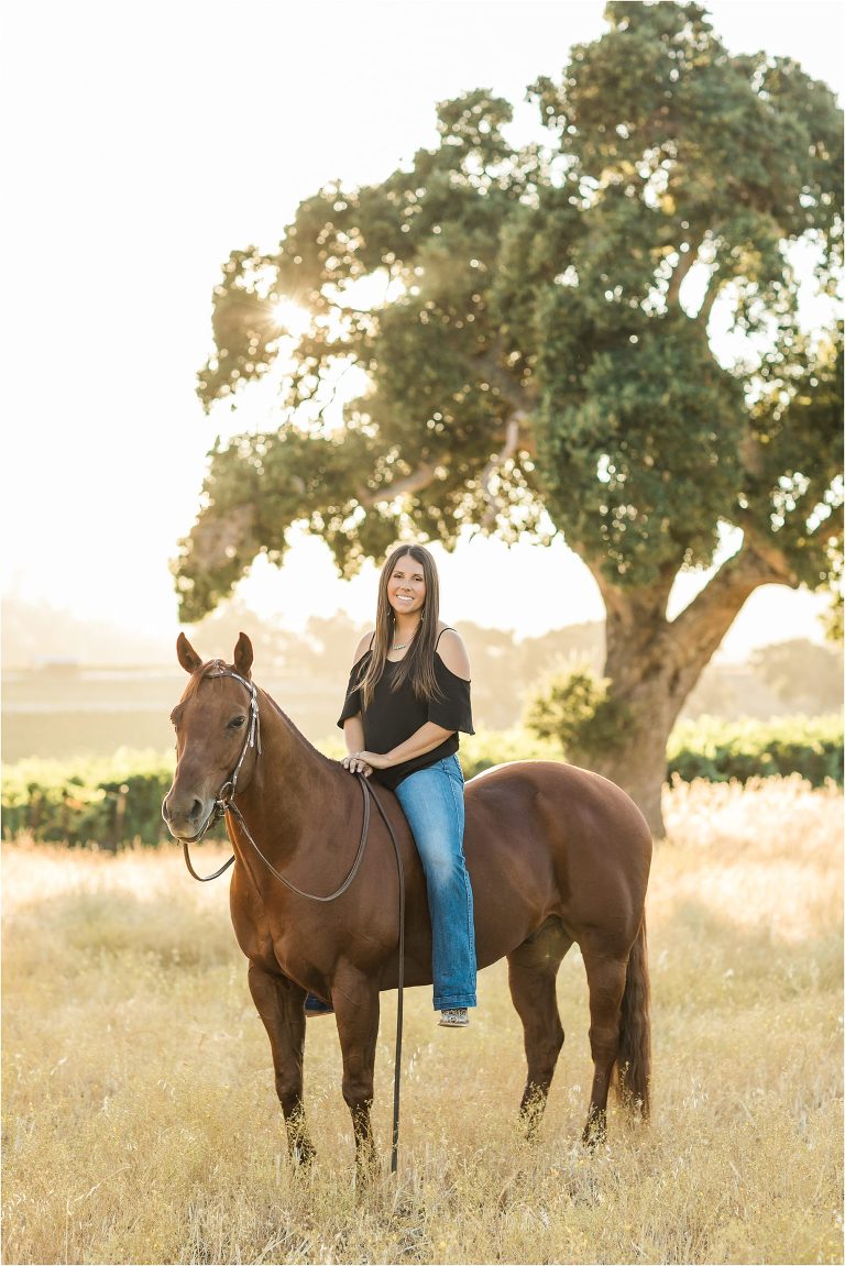 Cal Poly senior and her chestnut gelding photographed by Elizabeth Hay Photography at Oyster Ridge wedding venue and vineyard in Santa Margarita, California. 