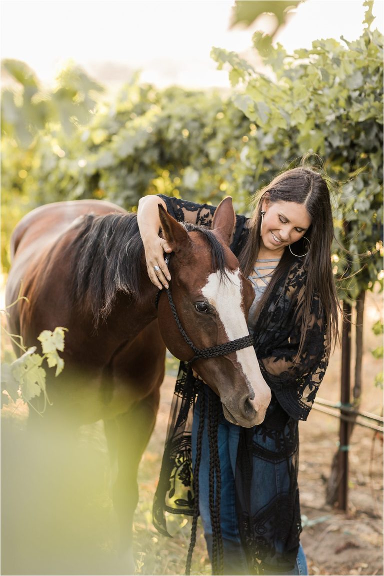 Oyster Ridge Equine session with girl and bay barrel horse in the vineyards by Elizabeth Hay Photography.