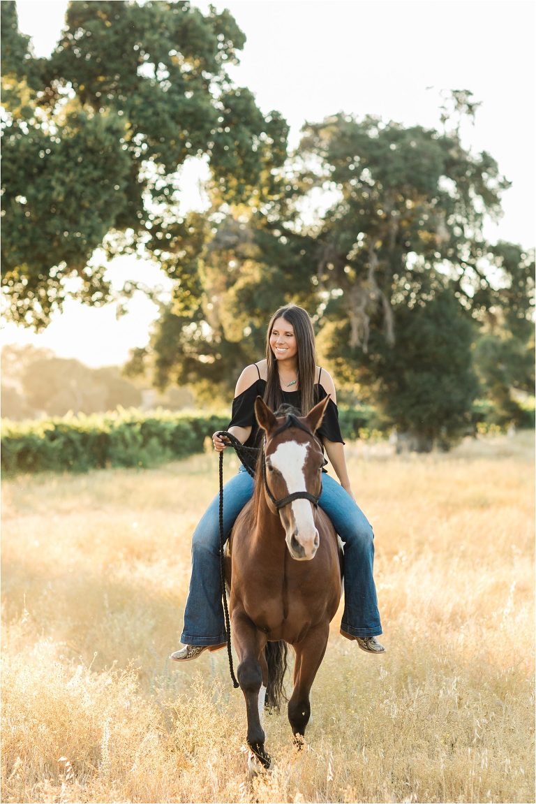 Cal Poly senior and her bay gelding riding bareback photographed by Elizabeth Hay Photography at Oyster Ridge in Santa Margarita, California. 