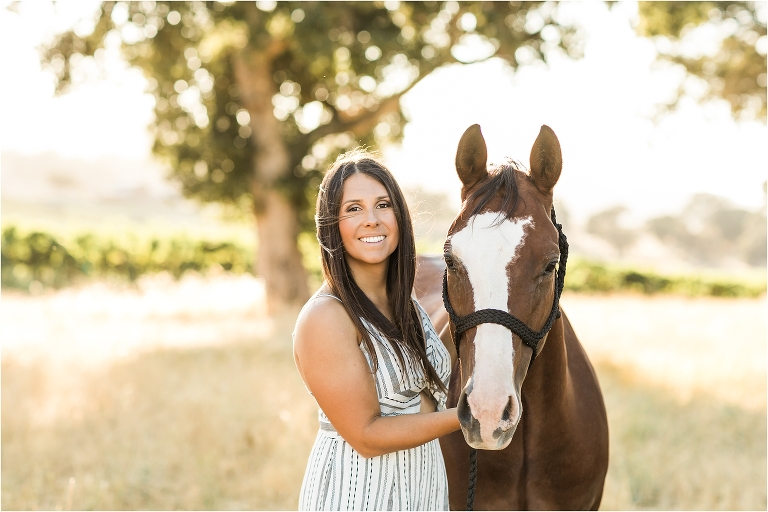 Cal Poly senior and her bay horse photographed by Elizabeth Hay Photography at Oyster Ridge in Santa Margarita, California. 