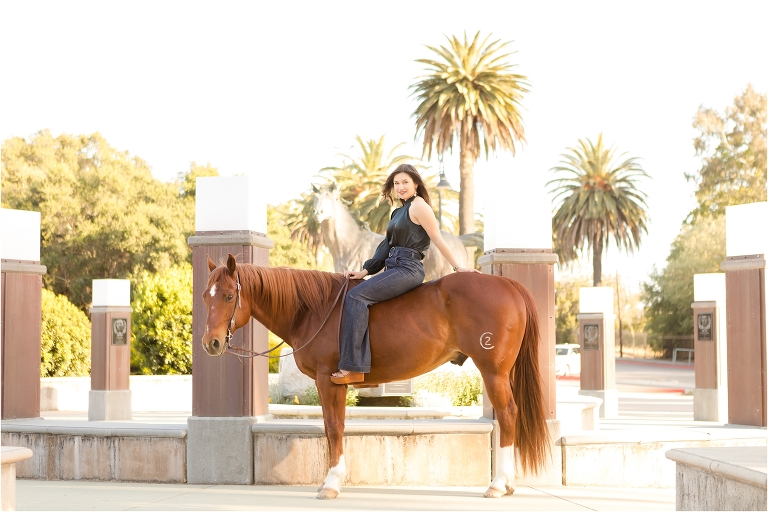 Cal Poly Senior Photography session by Cal Poly Mustang statue near the football field