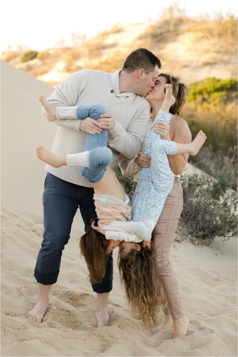 Pismo Beach Dunes Family Photography session by Elizabeth Hay Photography - parents holding kids upside down