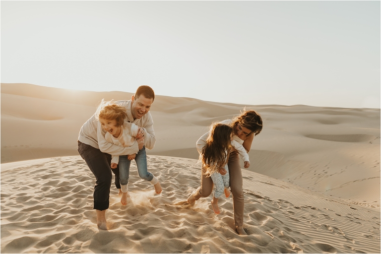 kids and parents at Pismo dunes by Elizabeth Hay Photography
