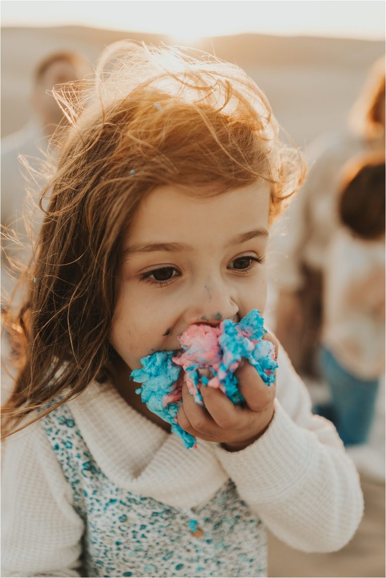 child eating cotton candy by Elizabeth Hay Photography