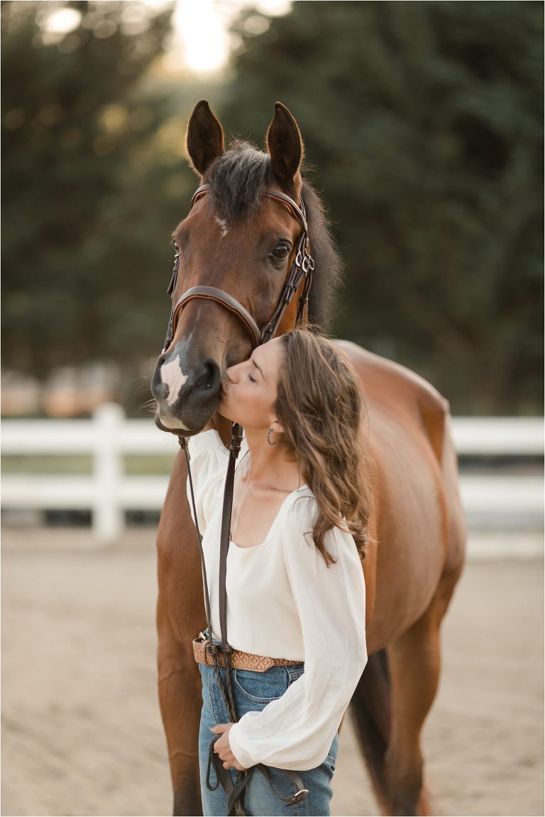Santa Barbara Equestrian Shoot with girl kissing bay horse Elizabeth Hay Photography