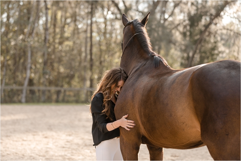 woman hugging her show jumping horse by California Equine Photographer Elizabeth Hay Photography