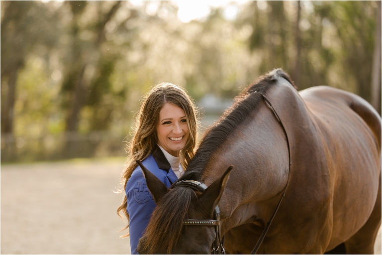 woman smiling with her show jumping horse by California Equine Photographer Elizabeth Hay Photography
