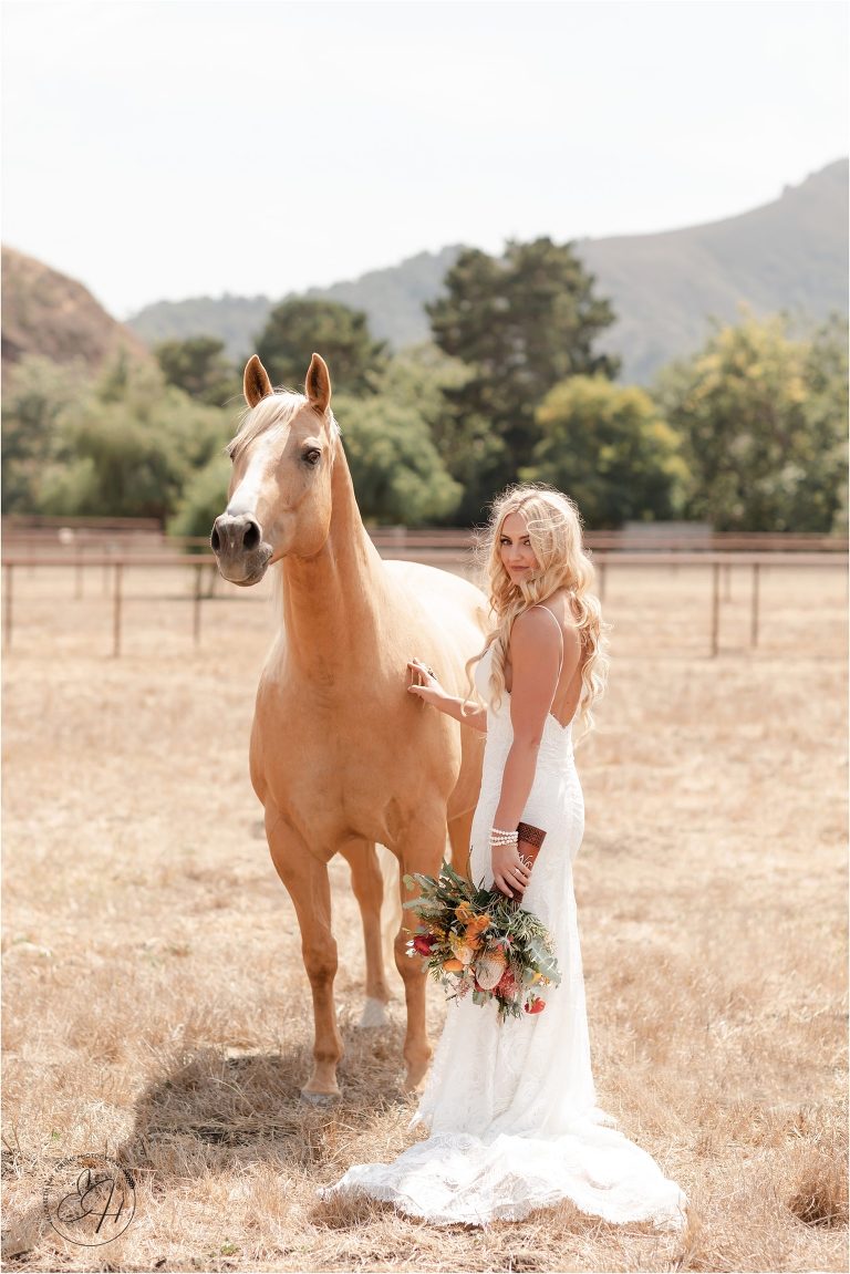 ranch bride and palomino horse before her Morro Bay Ranch wedding by Elizabeth Hay Photography
