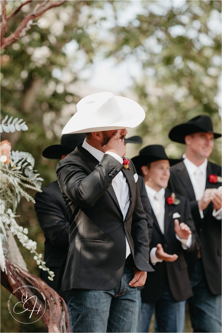 groom tearing up as he sees his bride come down the aisle at Morro Bay Ranch wedding by Elizabeth Hay Photography