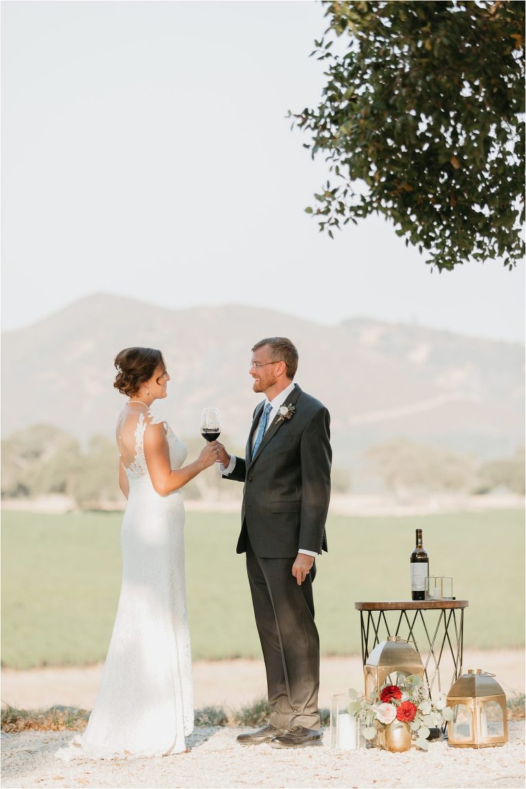 bride and groom drink wine at an Oyster Ridge Elopement wedding at a California Winery