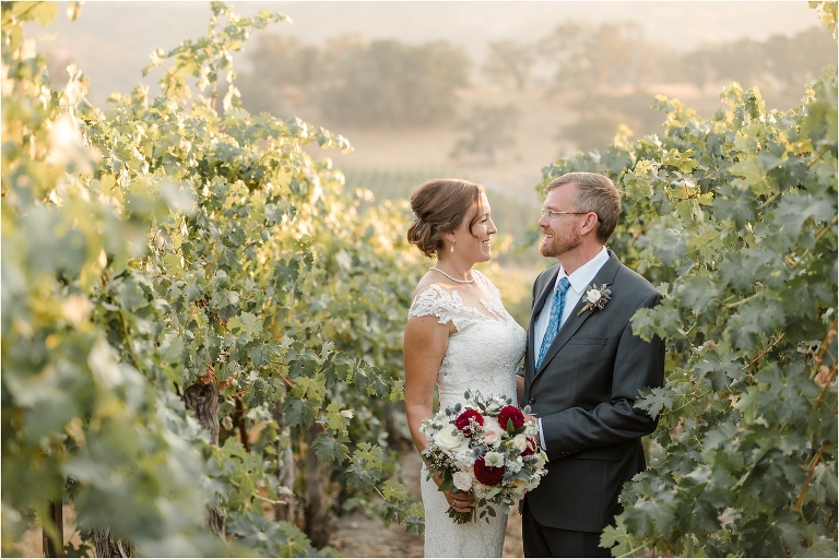 bride and groom in a vineyard Oyster Ridge Elopement wedding at a California Winery