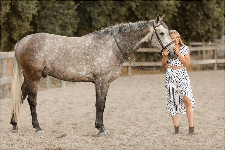 blonde girl and dapple grey gelding by California Equine Photographer Elizabeth Hay Photography at Oak Park Equestrian Center. 