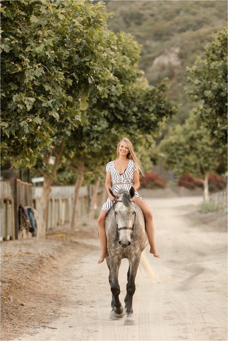 blonde girl and dapple grey gelding by California Equine Photographer Elizabeth Hay Photography. 