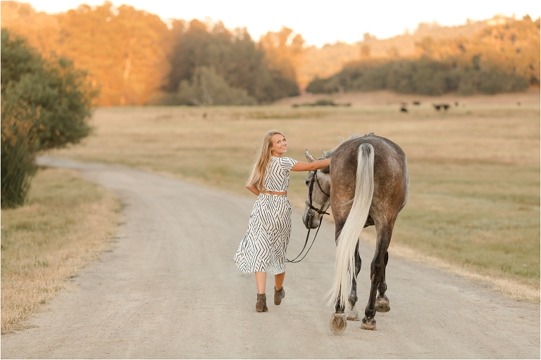 San Luis Obispo Equestrian session with Cal Poly graduate and dapple grey horse by Elizabeth Hay Photography.