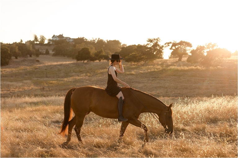 Milton Menasco x Celeris UK bespoke riding boot equestrian fashion shoot by California Equine Photographer Elizabeth Hay Photography with sorrel mare in golden field at sunset
