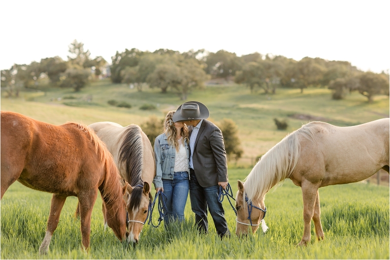 Western Engagement session with horses in a field by Elizabeth Hay Photography