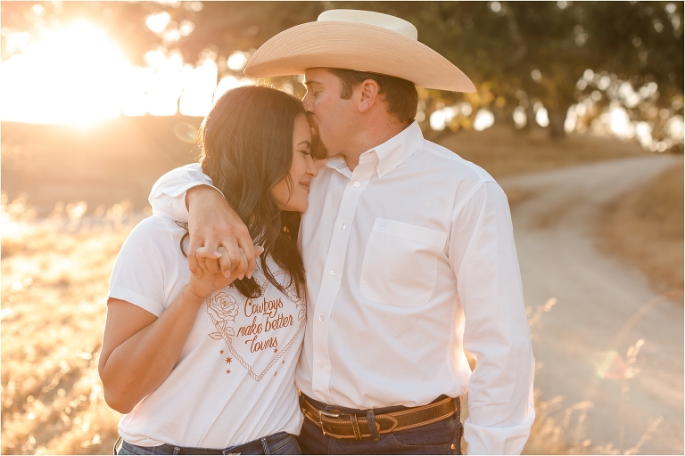 Paso Robles Engagement session at Epoch Estate Wines by Elizabeth Hay Photography with Becky and Mo snuggling. 