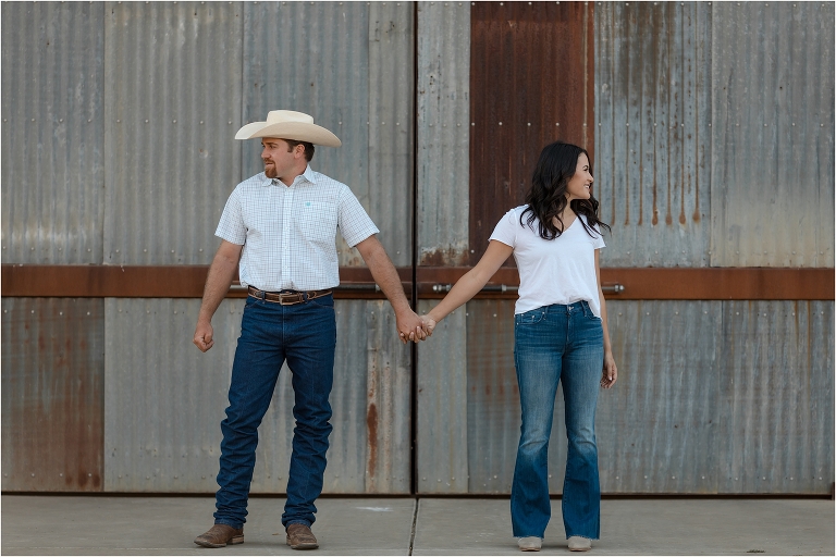 Paso Robles Engagement session at Epoch Estate Wines by Elizabeth Hay Photography with Becky and Mo in front of barn.