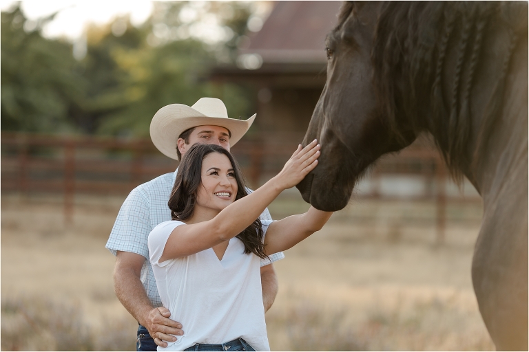 Paso Robles Engagement session at Epoch Estate Wines by Elizabeth Hay Photography with Becky and Mo and black Percheron horse. 