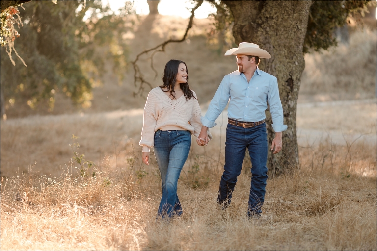 Paso Robles Engagement session at Epoch Estate Wines by Elizabeth Hay Photography with Becky and Mo walking. 