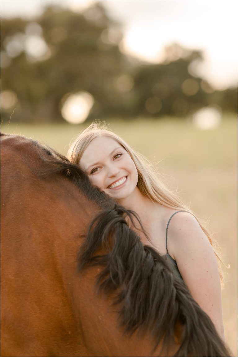 Equestrian Senior session with a girl and her bay horse in a golden field by California Equine Photographer Elizabeth Hay Photography.