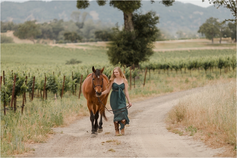 Cal Poly Equine Senior session with Jordan and her gelding Good Times in a vineyard by California Equine Photographer Elizabeth Hay Photography.
