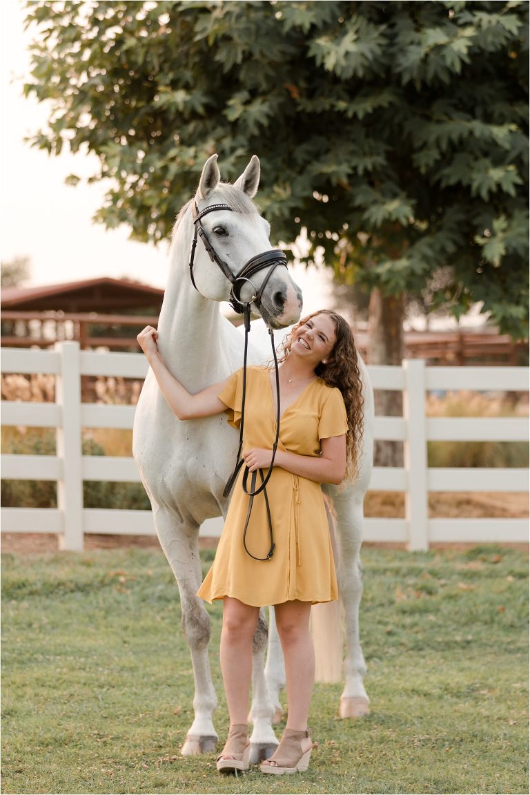 graduating equestrian and her horse by California Equine Photographer from San Luis Obispo, Elizabeth Hay Photography.