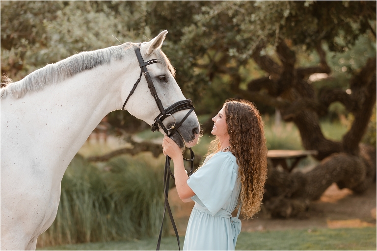 Santa Ynez Equine Photography session with graduate and grey horse from Trinity Eventing by California Equine Photographer Elizabeth Hay Photography.