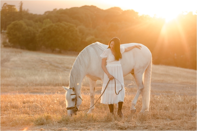 woman wearing Ulla Johnson dress at sunset with Lusitano gelding by California Equine Photographer Elizabeth Hay Photography