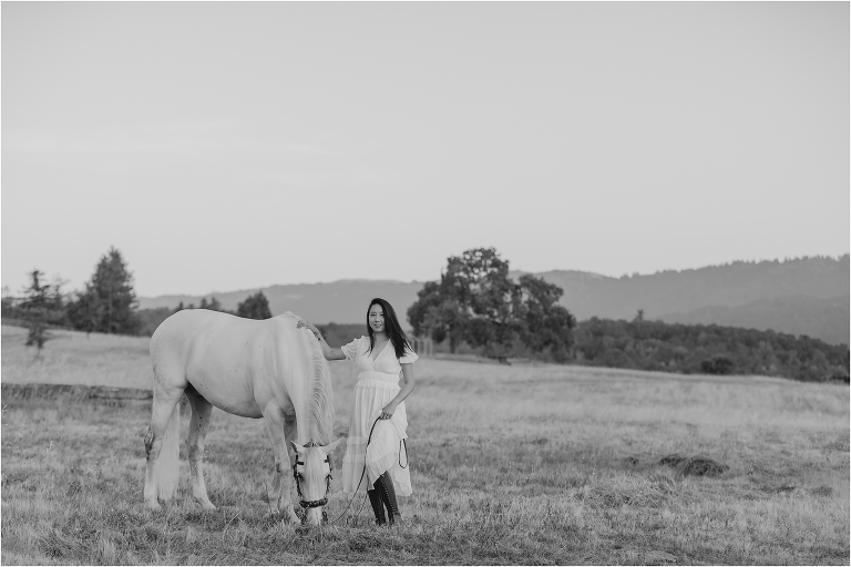 black and white image of woman and her white Lusitano gelding by California Equine Photographer Elizabeth Hay Photography