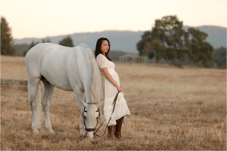 woman leaning on her white Lusitano gelding by California Equine Photographer Elizabeth Hay Photography