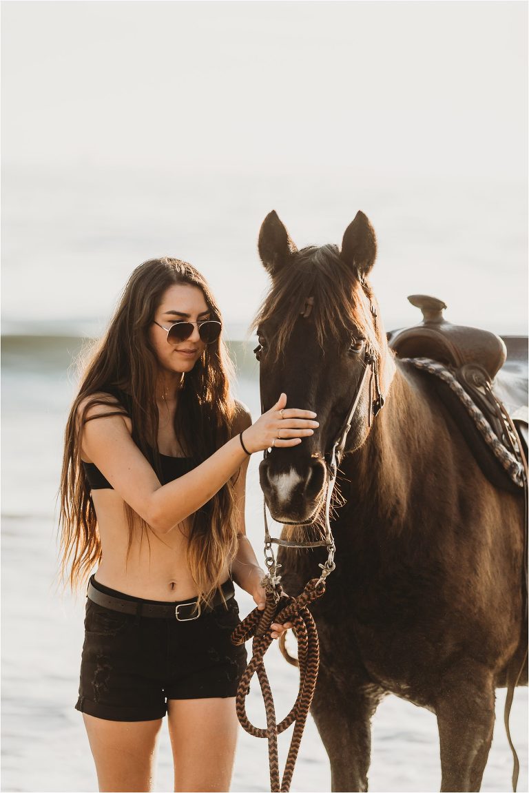 a girl and her horse Santa Barbara Equine Session on the beach with California Equine Photographer Elizabeth Hay Photography. 