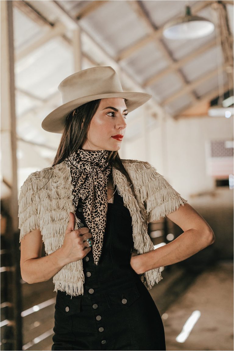 Western Fashion Style Inspo on the farm with Lindsay Branquinho in an old dairy barn aisle and a vintage Stetson hat by Elizabeth Hay 